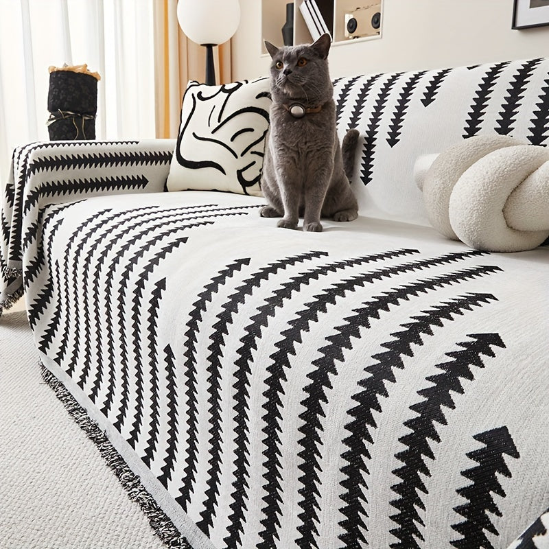 Chenille fabric sofa cover with decorative tassels

