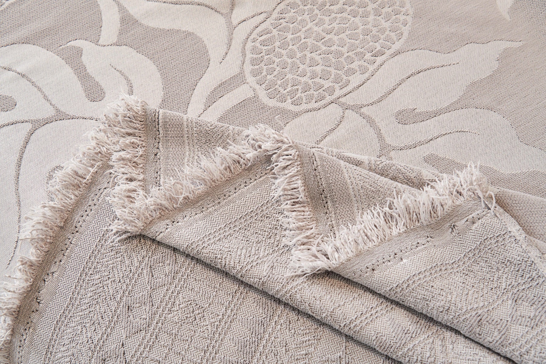 Sofa Decor Amalfi Palm Jacquard Sofa Throw Cover in Silver Palm - palm jacquard sofa throw cover fabric and edge detail in the UK, image 1
