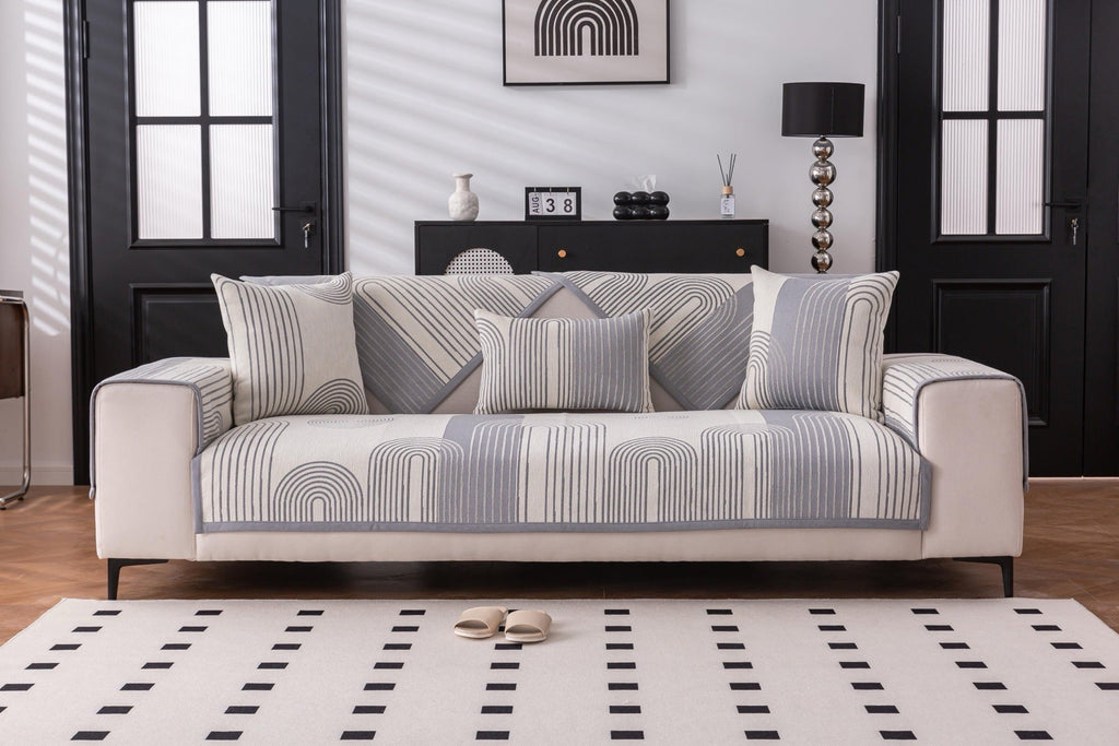 Sofa Decor Arcadia Arch Line Sofa Cover in Black Cream - styled sofa image for water resistant patterned couch covers in the UK