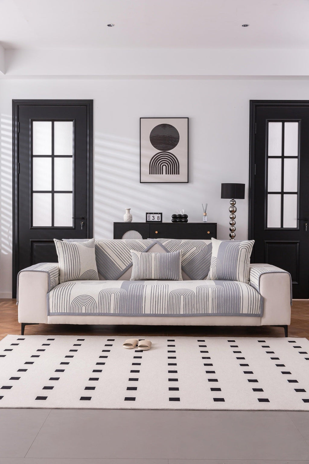 Sofa Decor Arcadia Arch Line Sofa Cover in Black Cream - styled sofa image for water resistant patterned couch covers in the UK