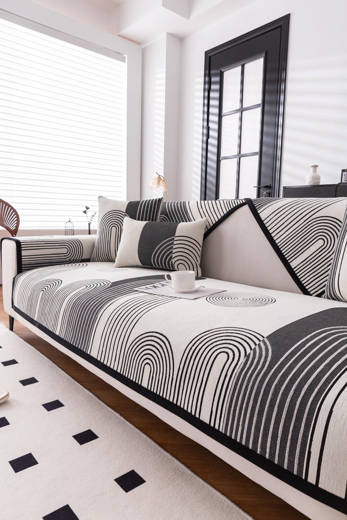 Sofa Decor Arcadia Arch Line Sofa Cover in Black Cream - styled sofa image for water resistant patterned couch covers in the UK
