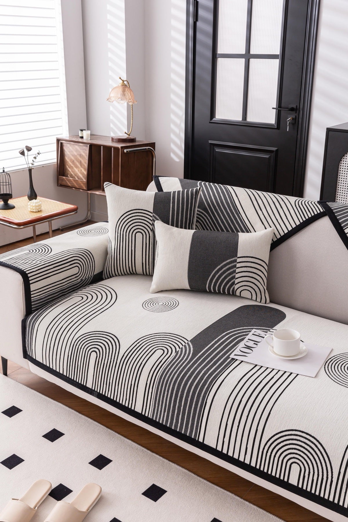 Sofa Decor Arcadia Arch Line Sofa Cover in Black Cream - styled sofa image for water resistant patterned couch covers in the UK