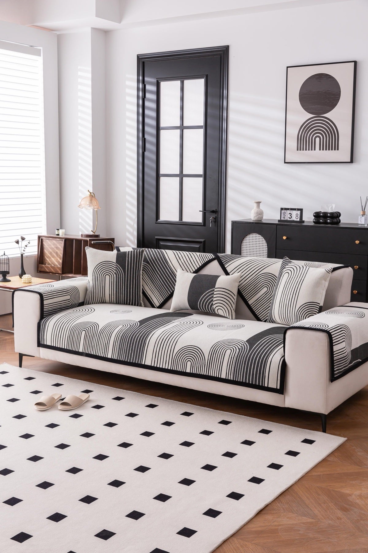 Sofa Decor Arcadia Arch Line Sofa Cover in Black Cream - styled sofa image for water resistant patterned couch covers in the UK