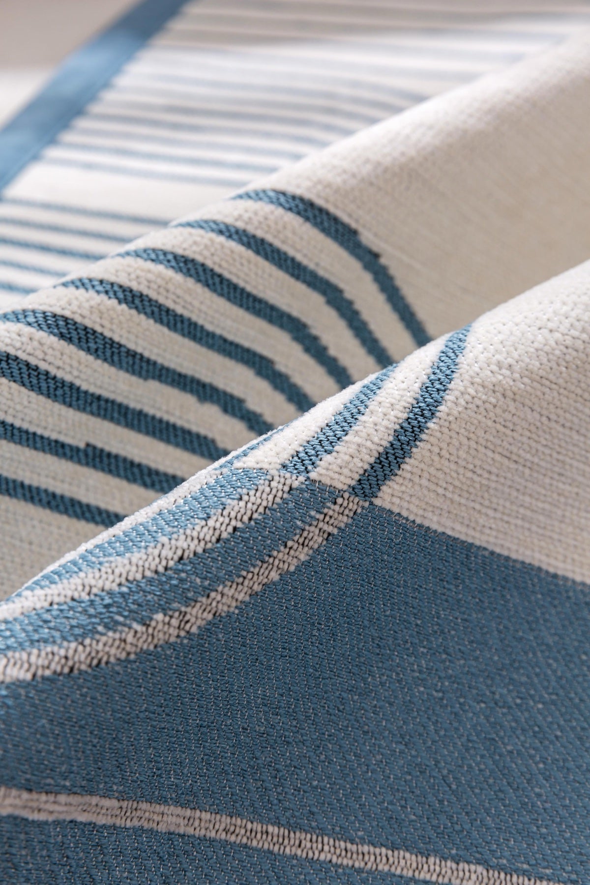 Sofa Decor Arcadia Arch Line Sofa Cover in Blue Cream - fabric texture detail image for water resistant patterned couch covers in the UK