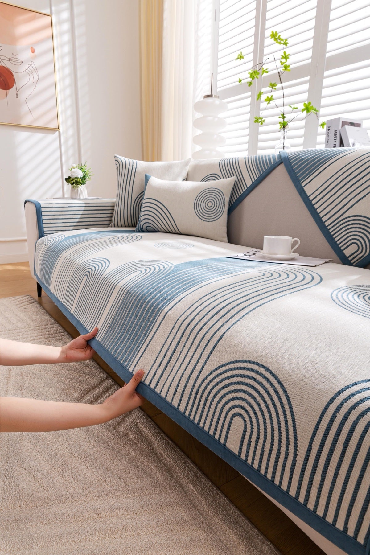 Sofa Decor Arcadia Arch Line Sofa Cover in Blue Cream - styled sofa image for water resistant patterned couch covers in the UK