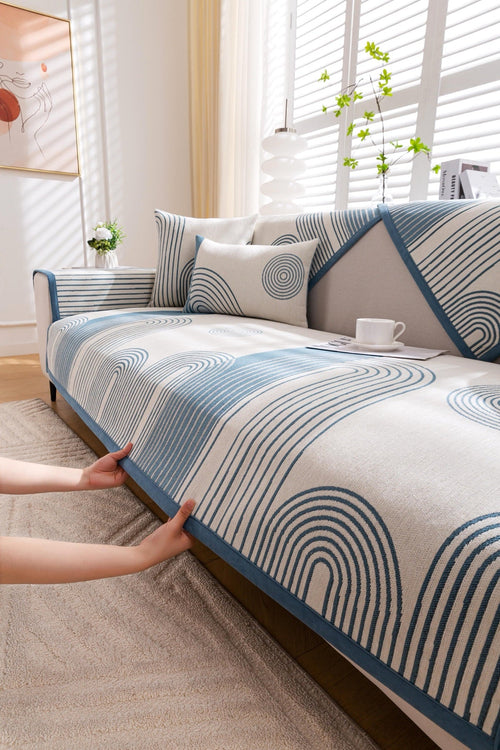 Sofa Decor Arcadia Arch Line Sofa Cover in Blue Cream - styled sofa image for water resistant patterned couch covers in the UK