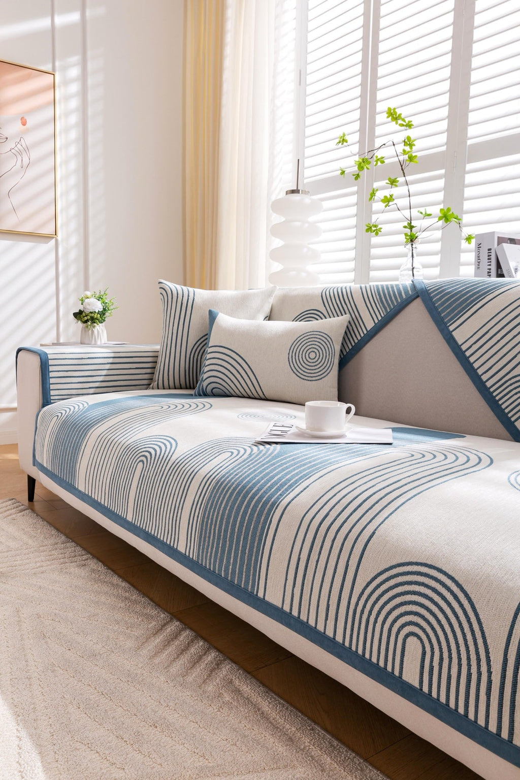 Sofa Decor Arcadia Arch Line Sofa Cover in Blue Cream - styled sofa image for water resistant patterned couch covers in the UK