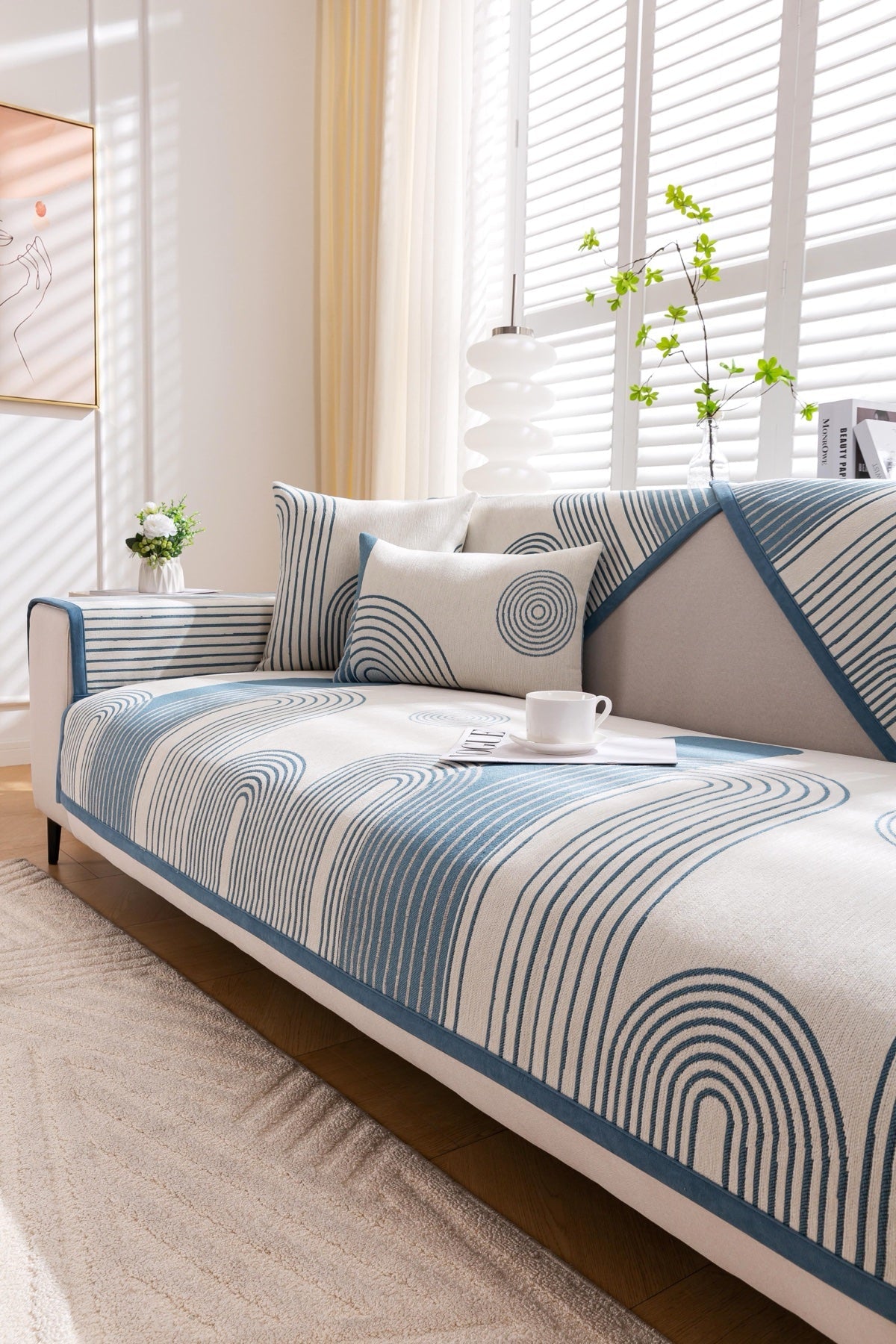 Sofa Decor Arcadia Arch Line Sofa Cover in Blue Cream - styled sofa image for water resistant patterned couch covers in the UK