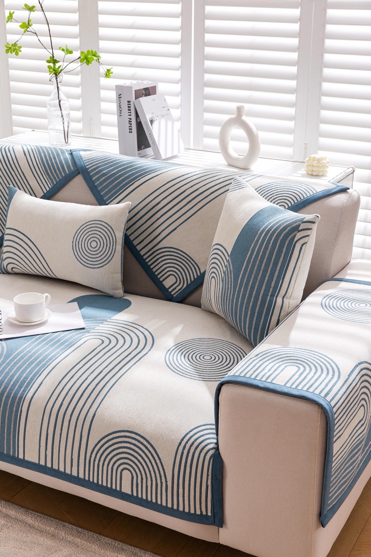 Sofa Decor Arcadia Arch Line Sofa Cover in Blue Cream - styled sofa image for water resistant patterned couch covers in the UK