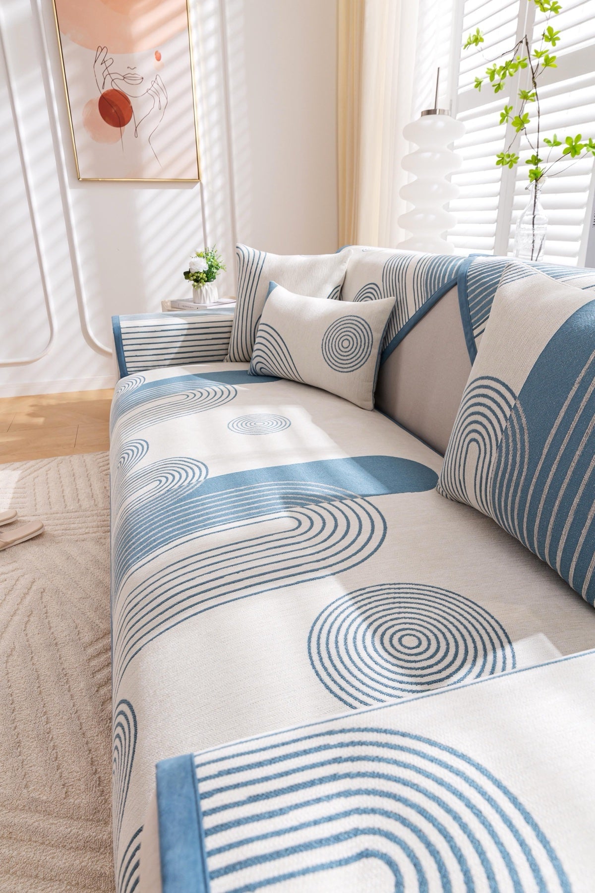 Sofa Decor Arcadia Arch Line Sofa Cover in Blue Cream - styled sofa image for water resistant patterned couch covers in the UK