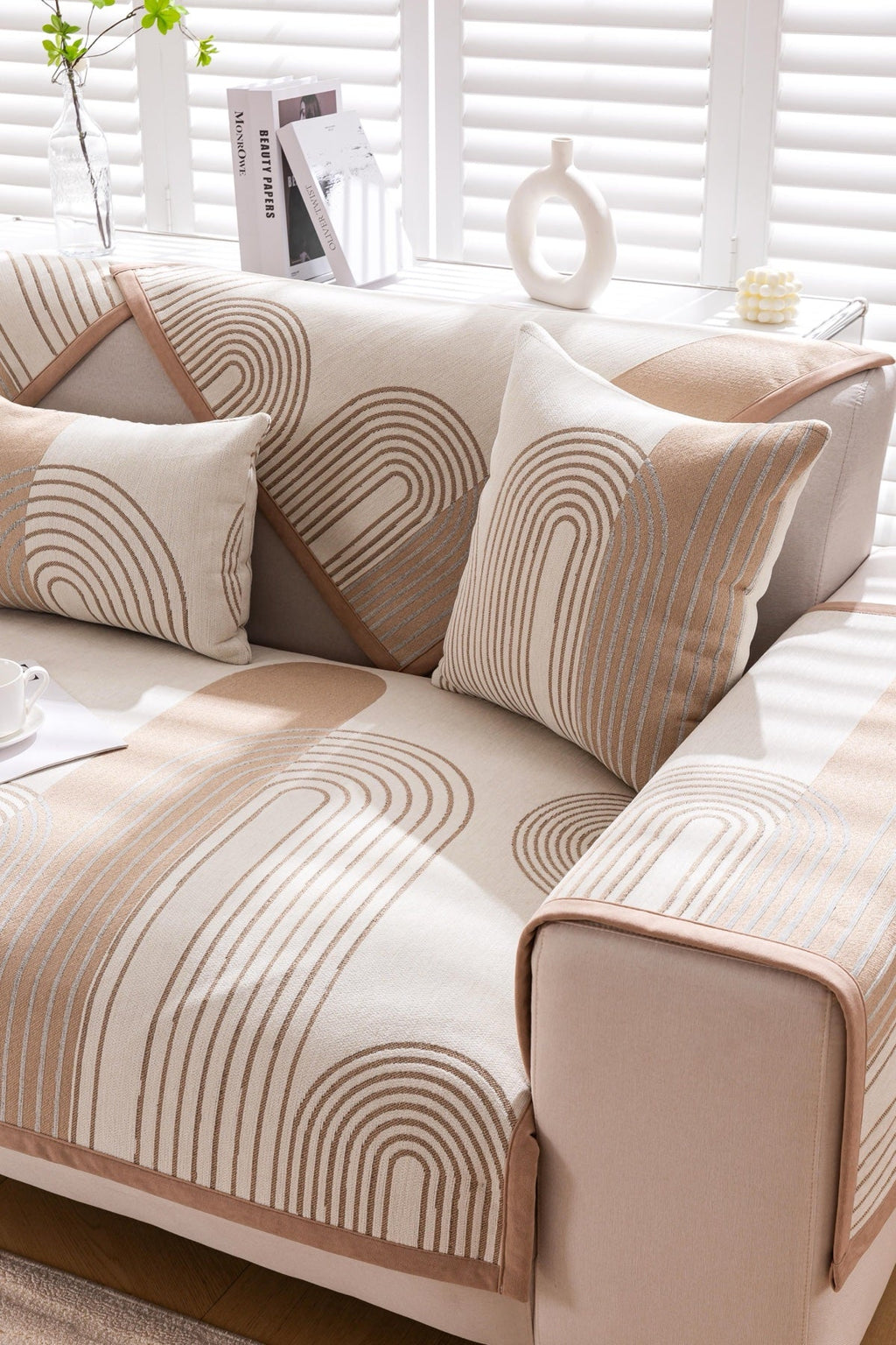 Sofa Decor Arcadia Arch Line Sofa Cover in Taupe Cream - styled sofa image for water resistant patterned couch covers in the UK