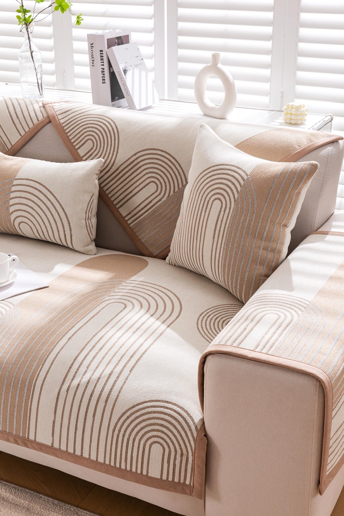 Sofa Decor Arcadia Arch Line Sofa Cover in Taupe Cream - styled sofa image for water resistant patterned couch covers in the UK