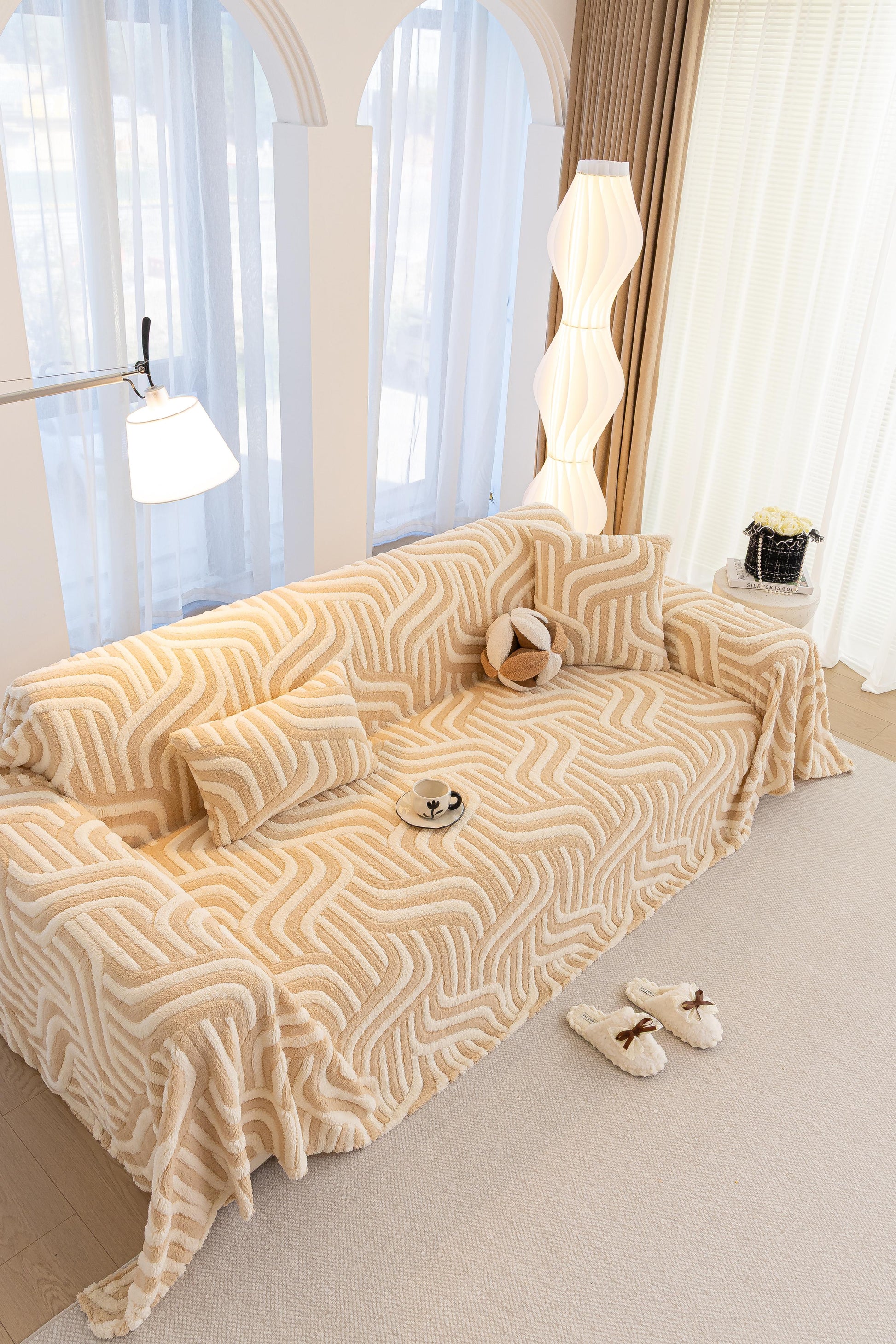 Sofa Decor Riviera Wave Stripe Sofa Cover in Beige Cream - styled sofa image for plush patterned couch covers in the UK