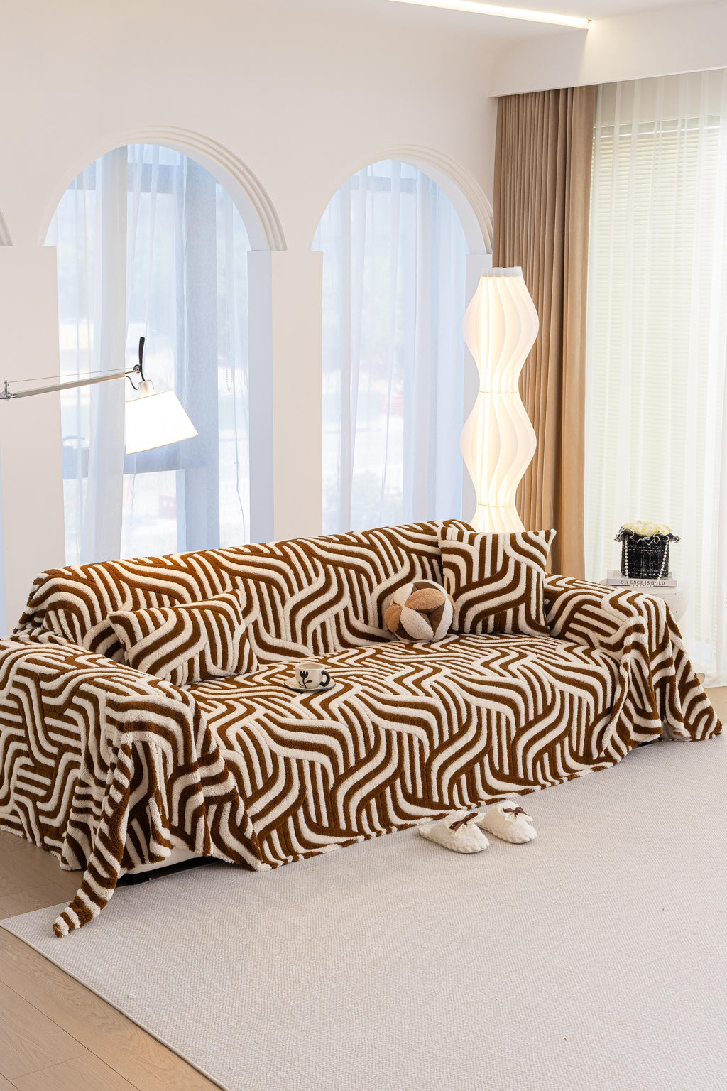 Sofa Decor Riviera Wave Stripe Sofa Cover in Brown Cream - styled sofa image for plush patterned couch covers in the UK