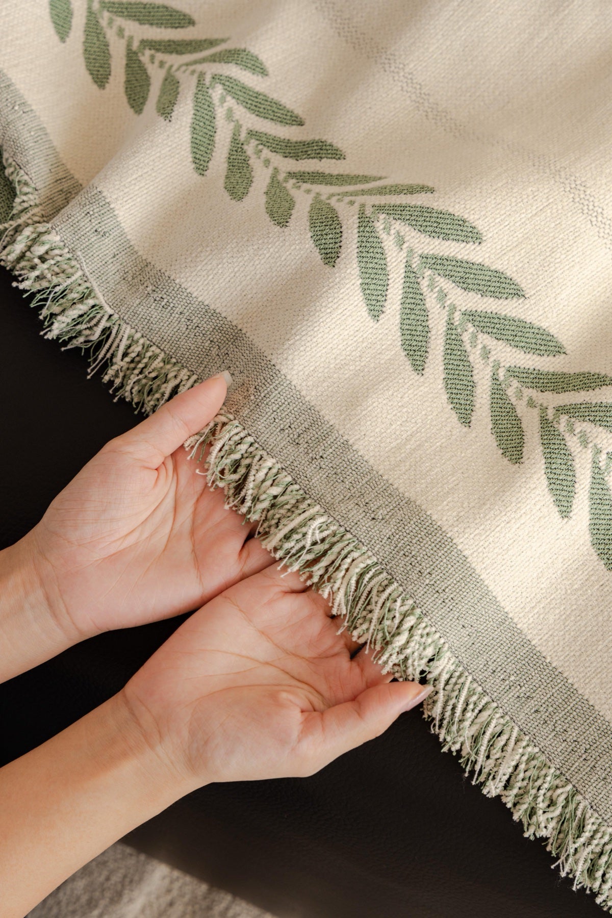 Sofa Decor Elowen Olive Border Sofa Throw Cover in Olive Border - olive border sofa throw cover hand and drape closeup in the UK, image 14