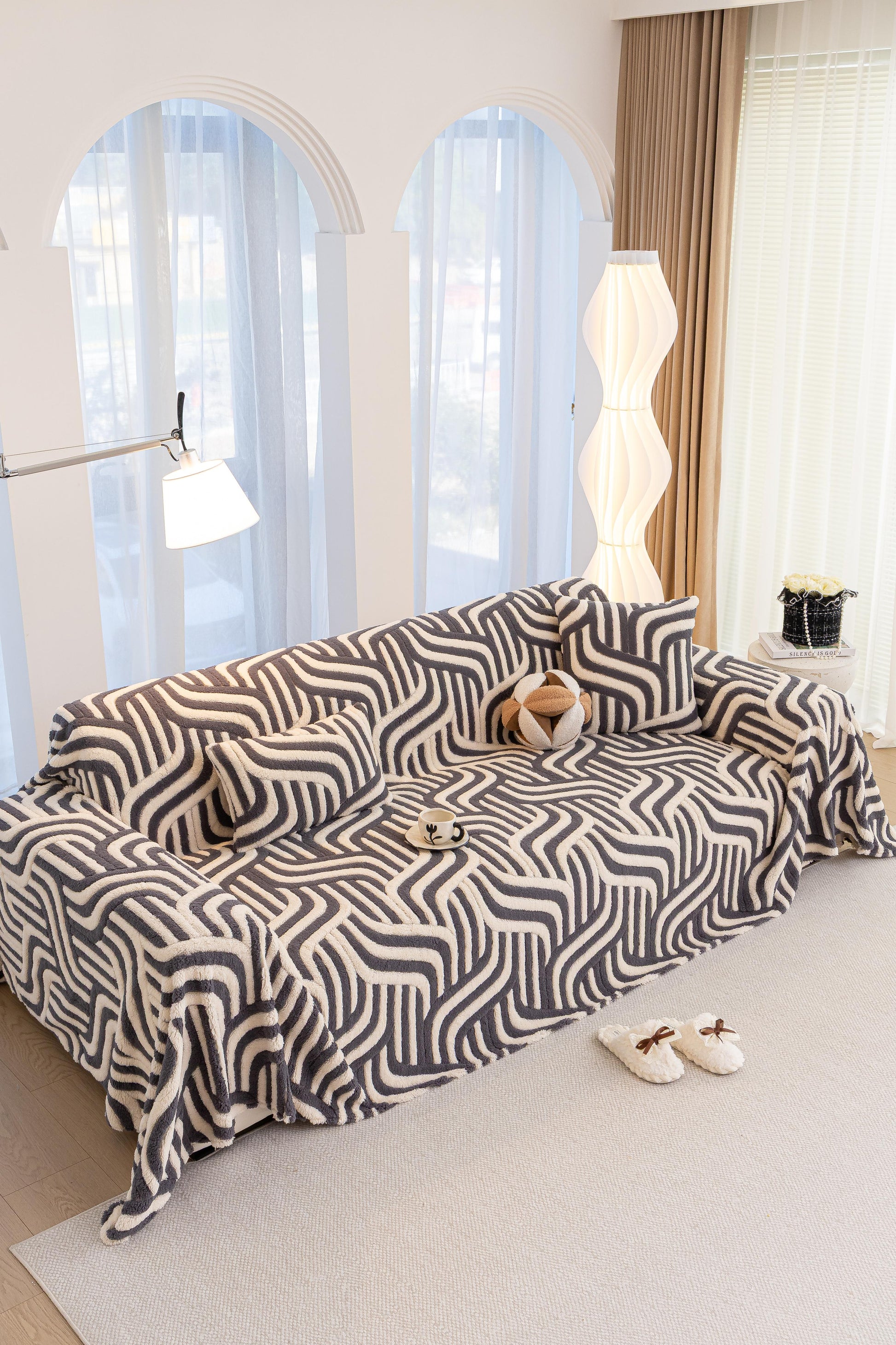 Sofa Decor Riviera Wave Stripe Sofa Cover in Grey Cream - styled sofa image for plush patterned couch covers in the UK