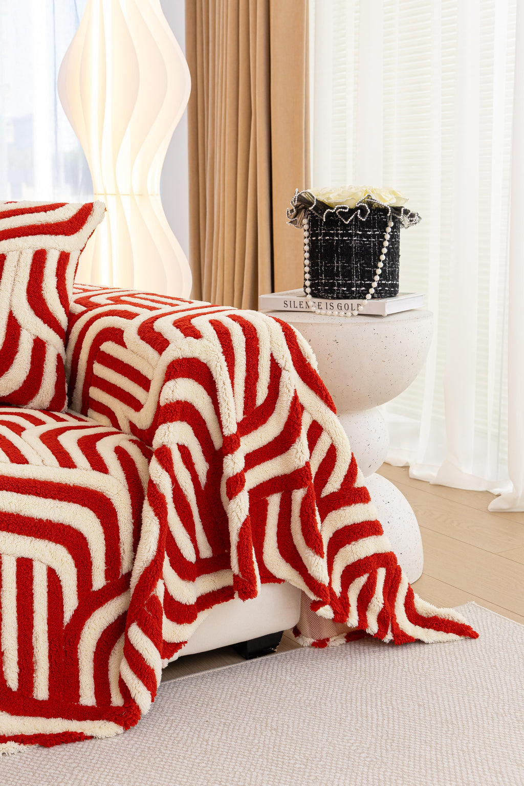 Sofa Decor Riviera Wave Stripe Sofa Cover in Red Cream - styled sofa image for plush patterned couch covers in the UK