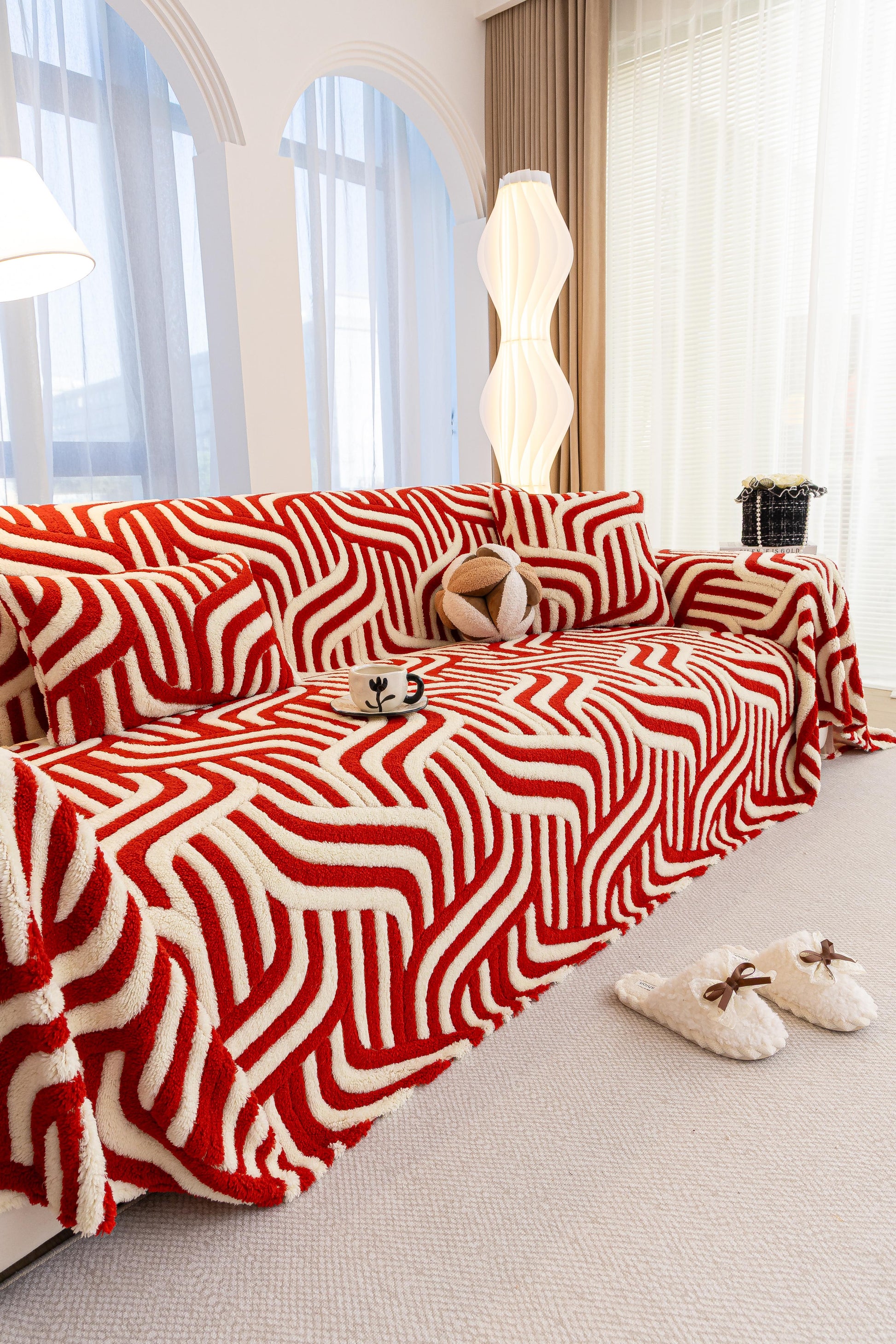 Sofa Decor Riviera Wave Stripe Sofa Cover in Red Cream - styled sofa image for plush patterned couch covers in the UK